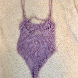 Lace bodysuit from Laura’s Boutique in liliac